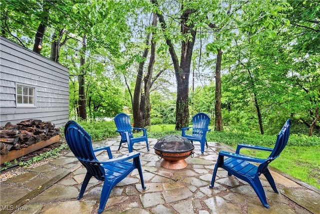 4493 Golfway Rd, South Euclid, OH 44121 - view of patio with a fire pit