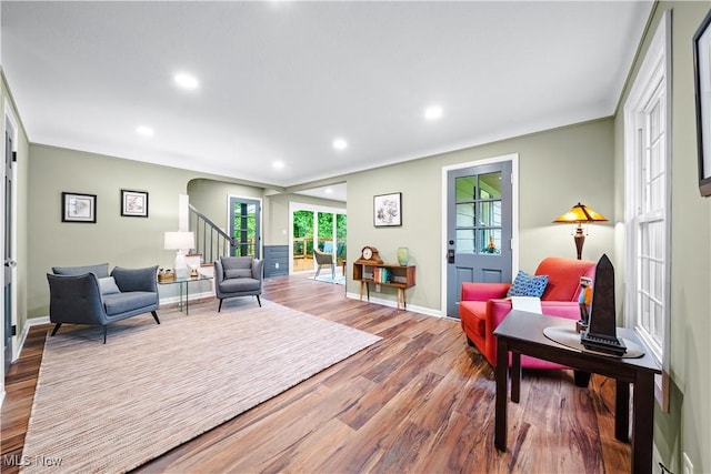 4493 Golfway Rd, South Euclid, OH 44121 - living area with wood finished floors, stairway, recessed lighting, arched walkways, and baseboards