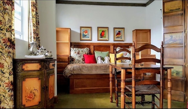 131 N Walnut St, Ravenna, OH 44266 - bedroom featuring finished concrete floors