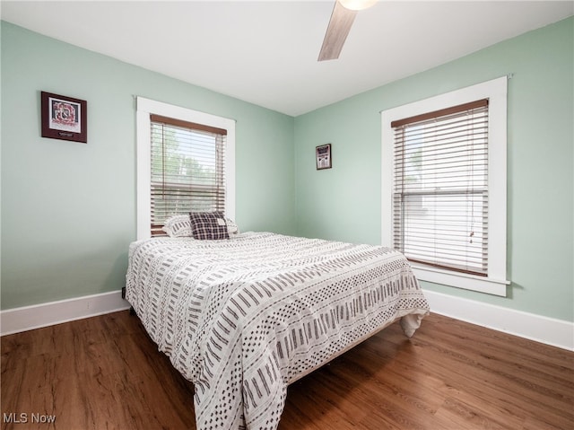 154 Montgomery Blvd, New Concord, OH 43762 - bedroom featuring baseboards, wood finished floors, and ceiling fan