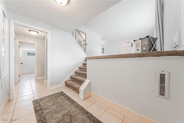 21517 Nottingham Dr, Fairview Park, OH 44126 - staircase with tile patterned floors and baseboards