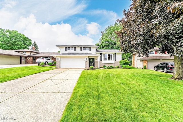 21517 Nottingham Dr, Fairview Park, OH 44126 - tri-level home featuring concrete driveway, brick siding, a front yard, and an attached garage