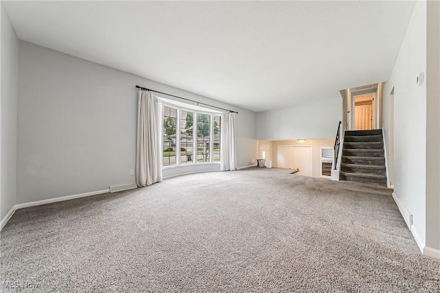 21517 Nottingham Dr, Fairview Park, OH 44126 - unfurnished living room featuring carpet, stairway, and baseboards