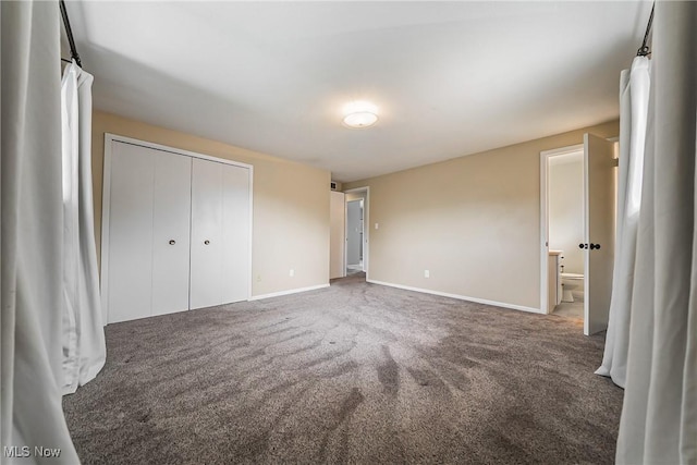 21517 Nottingham Dr, Fairview Park, OH 44126 - unfurnished bedroom with carpet flooring, baseboards, a closet, and connected bathroom