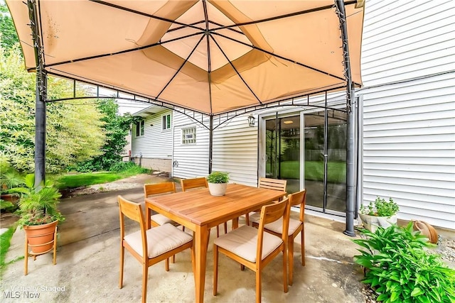 21517 Nottingham Dr, Fairview Park, OH 44126 - view of patio / terrace with outdoor dining area and a gazebo