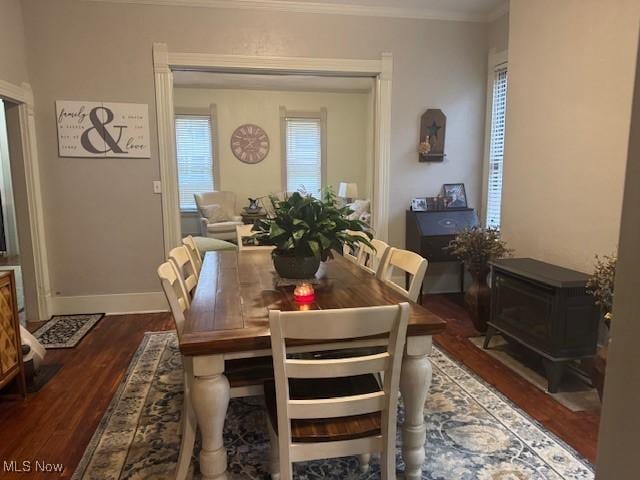 419 Commerce St, Wellsburg, WV 26070 - dining area featuring dark wood-style floors, crown molding, and baseboards
