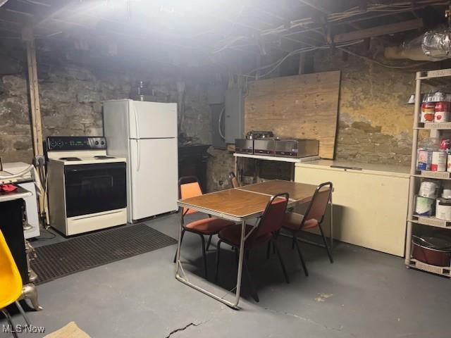 419 Commerce St, Wellsburg, WV 26070 - unfinished below grade area with freestanding refrigerator