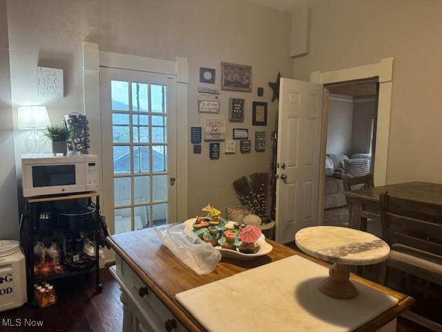 419 Commerce St, Wellsburg, WV 26070 - dining area featuring dark wood-style flooring