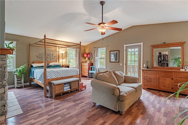 7170 Lafayette Rd, Medina, OH 44256 - bedroom featuring vaulted ceiling, wood finished floors, access to exterior, ceiling fan, and baseboards