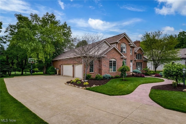 1955 Wendover Cir NE, North Canton, OH 44720 - traditional home featuring brick siding, concrete driveway, a front lawn, a garage, and a chimney