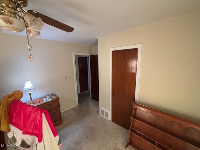 1055 Whittier Ave, Akron, OH 44320 - bedroom with ceiling fan and concrete floors
