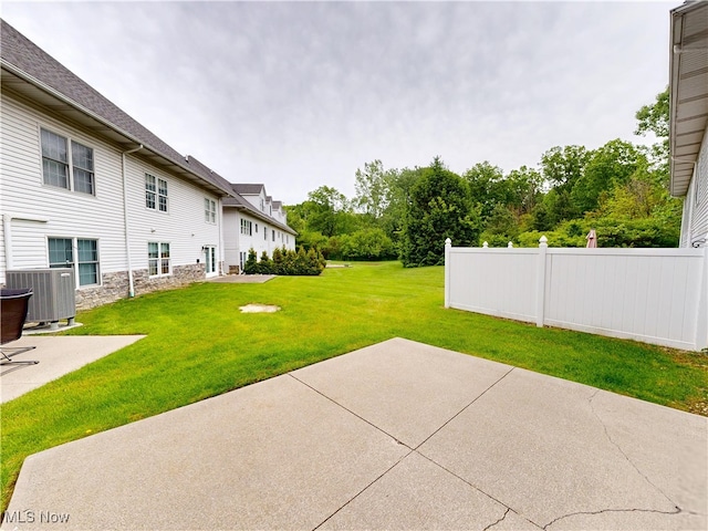 809 Fiddlers Crk, Painesville, OH 44077 - view of yard with a patio area and central air condition unit