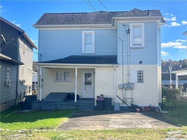 3871 Central Ave, Shadyside, OH 43947 - back of house with a patio area, roof with shingles, and a lawn
