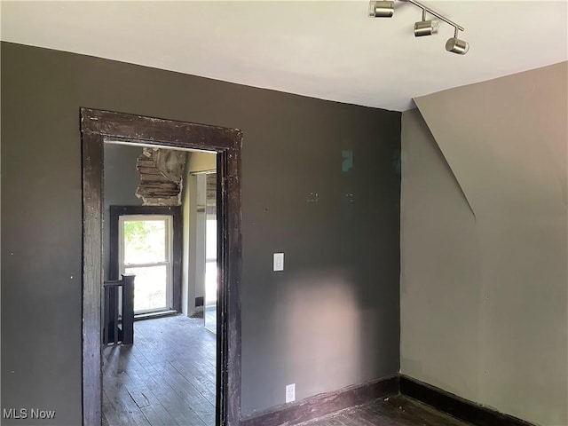 405 Bliss Ave, Conneaut, OH 44030 - unfurnished room featuring rail lighting and hardwood / wood-style floors