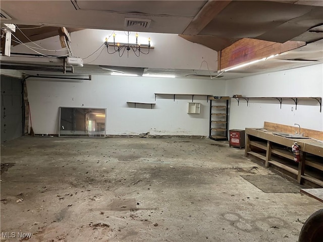 405 Bliss Ave, Conneaut, OH 44030 - garage featuring a workshop area and a garage door opener