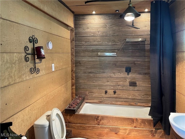 405 Bliss Ave, Conneaut, OH 44030 - bathroom featuring wooden walls and shower / bath combo