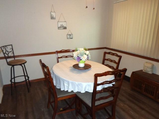 816 Gino Ln Unit 816, Cleveland, OH 44109 - dining area with wood finished floors and baseboards