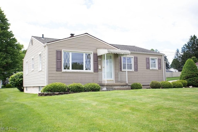 430 W Harvey St, Struthers, OH 44471 - view of front of house with a front yard and roof with shingles