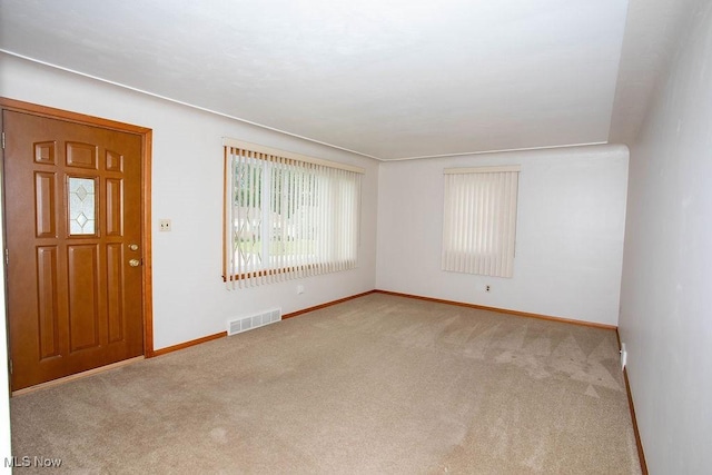 430 W Harvey St, Struthers, OH 44471 - entrance foyer featuring carpet floors and baseboards