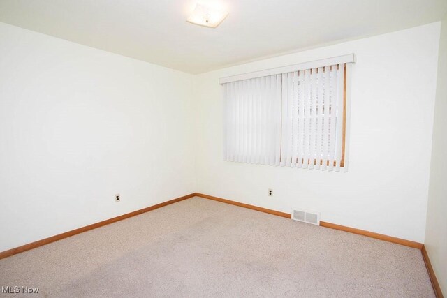 430 W Harvey St, Struthers, OH 44471 - empty room with carpet and baseboards