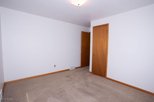 430 W Harvey St, Struthers, OH 44471 - carpeted spare room with baseboards