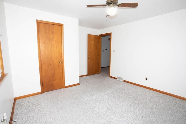 430 W Harvey St, Struthers, OH 44471 - unfurnished room with carpet floors, baseboards, and a ceiling fan