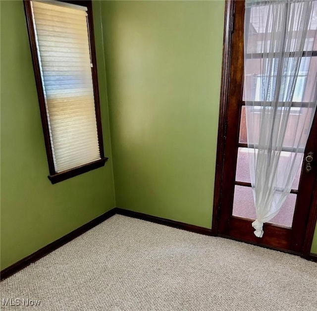 104 Sunnycliff Dr, Euclid, OH 44123 - spare room featuring carpet and baseboards