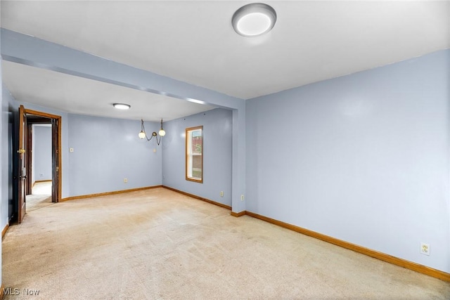 916 Kling St, Akron, OH 44311 - empty room with baseboards and carpet flooring