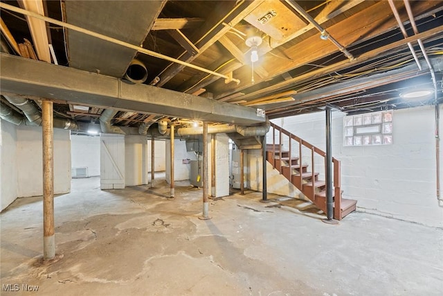 916 Kling St, Akron, OH 44311 - basement with stairway and electric water heater