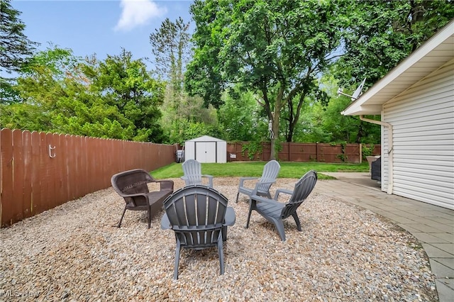5512 Berkshire Dr, North Olmsted, OH 44070 - view of yard featuring a fire pit, a patio area, and view of scattered trees