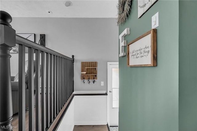 5512 Berkshire Dr, North Olmsted, OH 44070 - staircase featuring wood finished floors