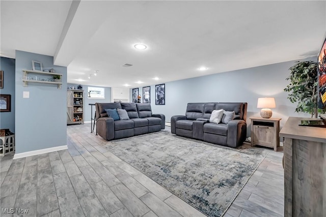 5512 Berkshire Dr, North Olmsted, OH 44070 - living area featuring recessed lighting, light wood-style floors, and baseboards