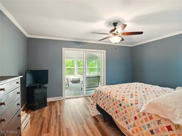 4300 Wade Ave, Ashtabula, OH 44004 - bedroom featuring access to outside, wood finished floors, ornamental molding, and a ceiling fan