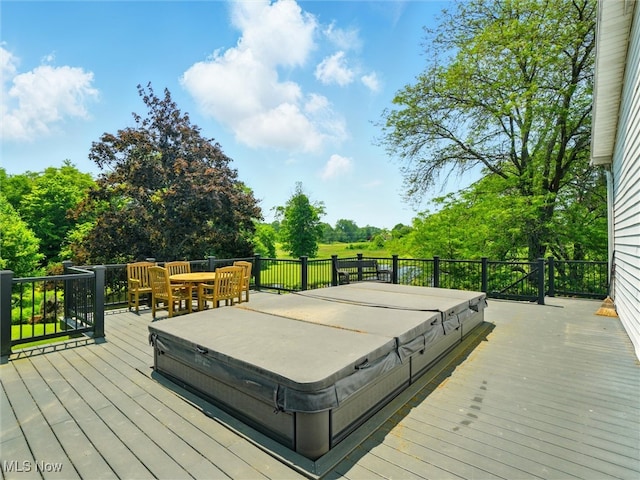 4300 Wade Ave, Ashtabula, OH 44004 - deck featuring a covered hot tub and view of scattered trees