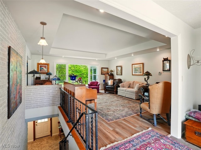 4300 Wade Ave, Ashtabula, OH 44004 - living area featuring a tray ceiling and wood finished floors