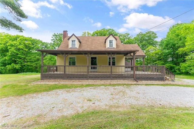 15800 Shilling Rd, Berlin Center, OH 44401 - view of front facade featuring a chimney, a porch, and a front yard