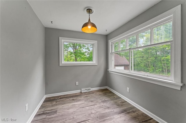 15800 Shilling Rd, Berlin Center, OH 44401 - spare room featuring baseboards and wood finished floors