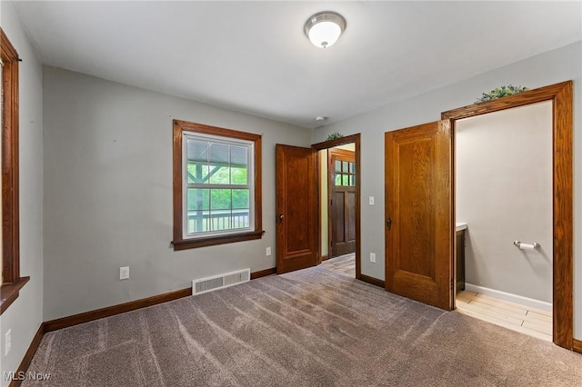 15800 Shilling Rd, Berlin Center, OH 44401 - unfurnished bedroom featuring light carpet and baseboards