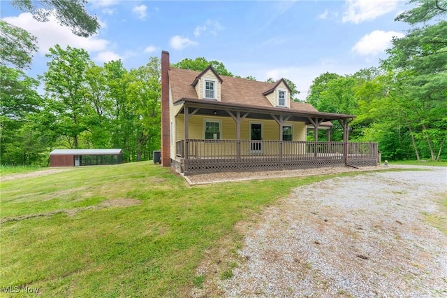 15800 Shilling Rd, Berlin Center, OH 44401 - view of front of property with a front lawn, a chimney, covered porch, cooling unit, and driveway