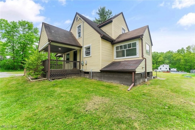 15800 Shilling Rd, Berlin Center, OH 44401 - rear view of property featuring a yard and a shingled roof