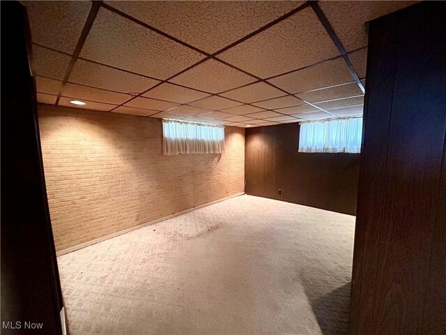 56400 Boyd Ave, Bridgeport, OH 43912 - basement with a drop ceiling, carpet flooring, and brick wall