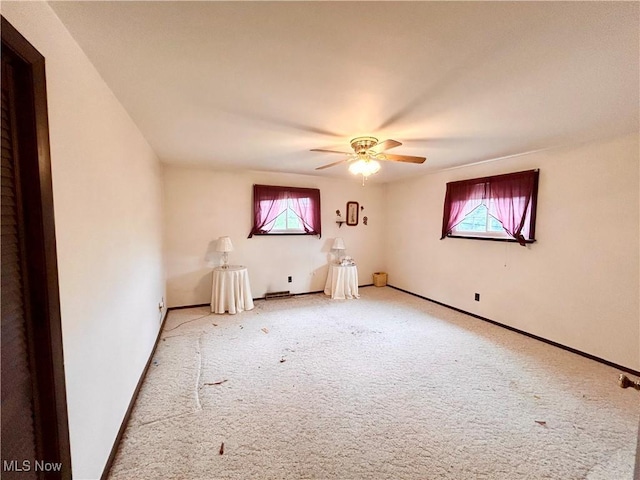 56400 Boyd Ave, Bridgeport, OH 43912 - spare room with carpet, healthy amount of natural light, ceiling fan, and baseboards