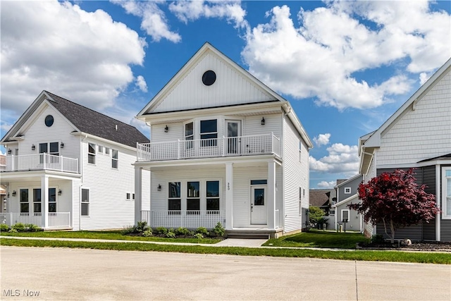360 Bascule Dr, Lorain, OH 44052 - view of front of house featuring a balcony and a porch