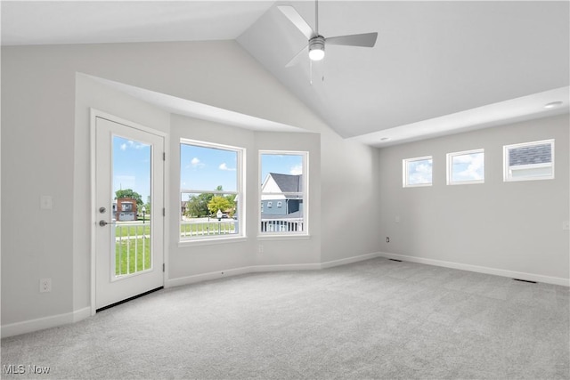 360 Bascule Dr, Lorain, OH 44052 - empty room featuring carpet floors, ceiling fan, and high vaulted ceiling