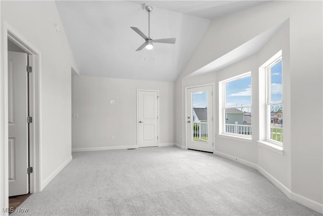 360 Bascule Dr, Lorain, OH 44052 - carpeted empty room with ceiling fan and high vaulted ceiling