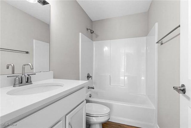 360 Bascule Dr, Lorain, OH 44052 - bathroom with vanity, shower / washtub combination, and wood finished floors