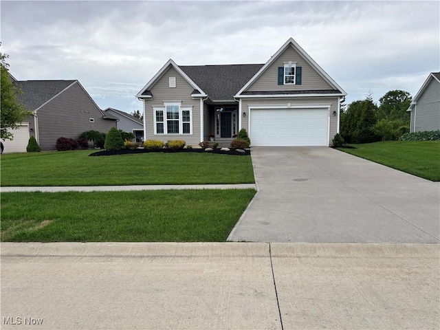 36580 Annie Ln, North Ridgeville, OH 44039 - traditional-style house with a garage, a front yard, and driveway