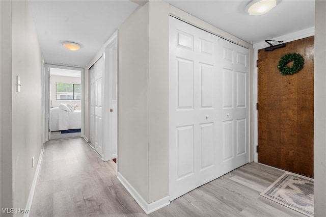 6290 Greenwood Pkwy Unit 402, Northfield, OH 44067 - hall with light wood-style floors and baseboards