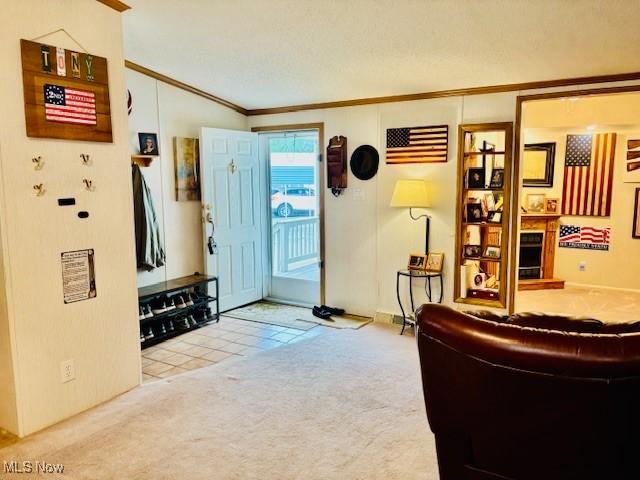 147 Northgate Dr NE, Warren, OH 44484 - carpeted living area featuring crown molding