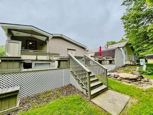147 Northgate Dr NE, Warren, OH 44484 - view of property exterior featuring stairs